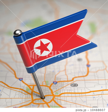 North Korea Small Flag on a Map Background. North Korea Small Flag on a Map Background. 10488607