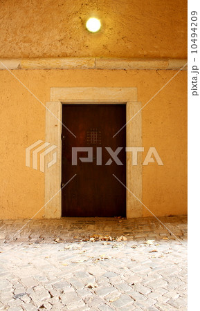 Old wooden door in Citadel Barracks in St. Petersberg Old wooden door in Citadel Barracks in St. Petersberg 10494209