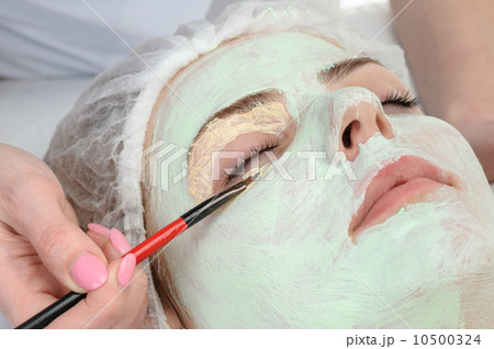 beauty salon, facial mask applying 10500324