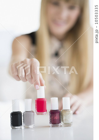Woman choosing nail polish 10503335