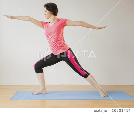 Woman doing yoga Woman doing yoga 10503414