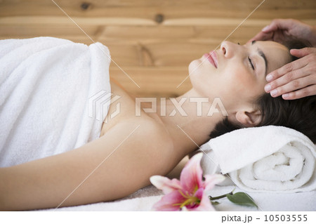 Woman receiving massage in spa Woman receiving massage in spa 10503555