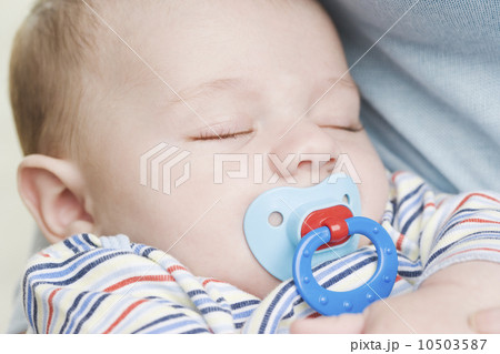 Close up of sleeping baby with pacifier 10503587