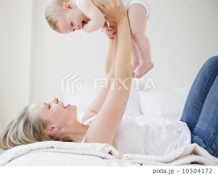 Mother playing with her baby Mother playing with her baby 10504172