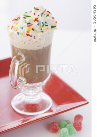 Close up of milkshake and gumdrops Close up of milkshake and gumdrops 10504595