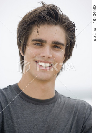 Close up of young man smiling Close up of young man smiling 10504688