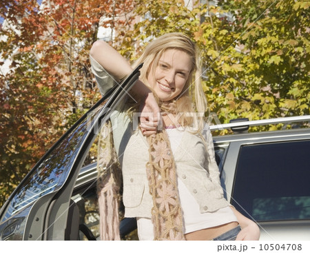Woman posing with her car 10504708