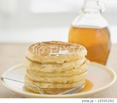 Close up of waffles and syrup Close up of waffles and syrup 10505262