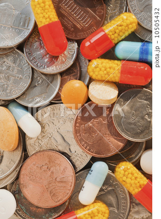 Assorted coins and pills 10505432