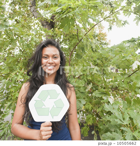 Woman holding recycle sign Woman holding recycle sign 10505662