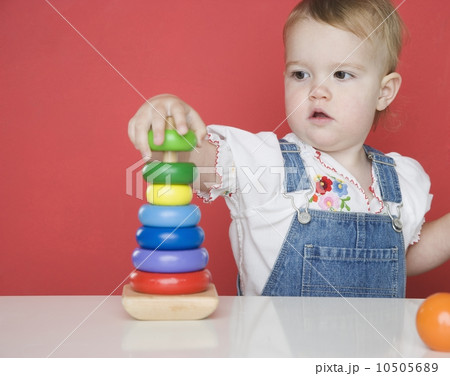 Female toddler playing with rings 10505689