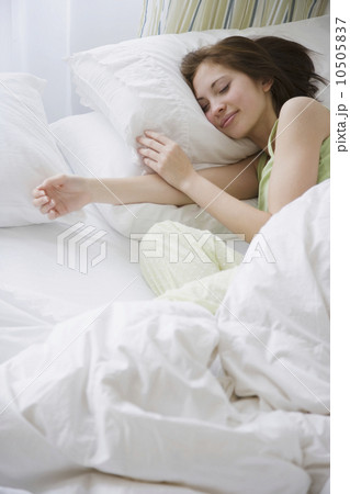 Woman sleeping in bed Woman sleeping in bed 10505837