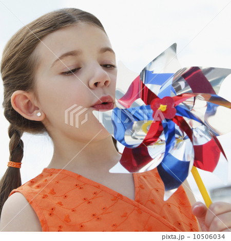 Child with pinwheel Child with pinwheel 10506034