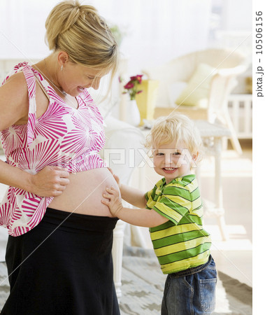 Baby touching mother’s pregnant belly Baby touching mother’s pregnant belly 10506156