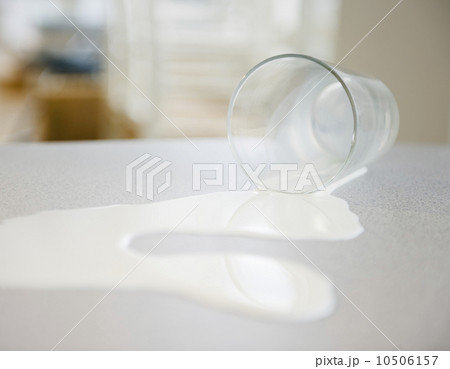 Spilt glass of milk Spilt glass of milk 10506157