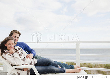 Couple on lounge chair Couple on lounge chair 10506554