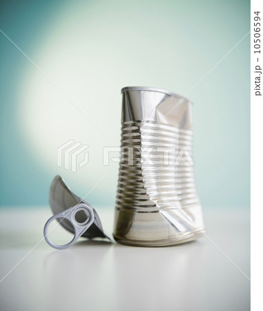 Damaged tin can 10506594