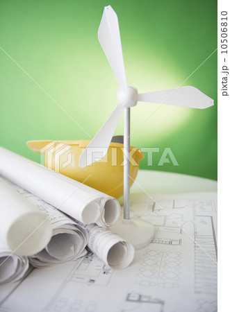 Close up of model of wind turbine and blueprints Close up of model of wind turbine and blueprints 10506810