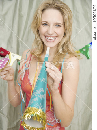 Portrait of woman at birthday party 10506876