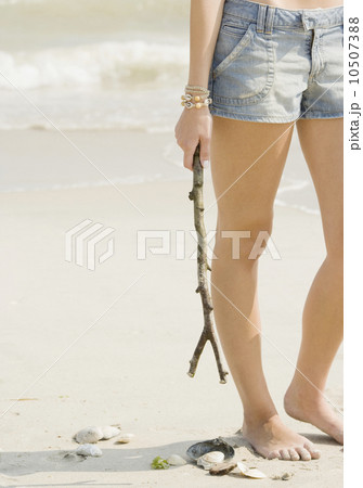 Young woman at beach Young woman at beach 10507388