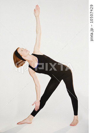 Woman doing yoga position 10507429