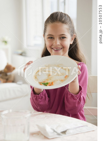 Young girl holding plate 10507553