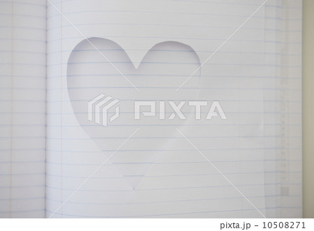Heart shape cut out of note book 10508271