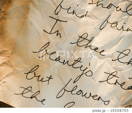 Close up of antique love letter on parchment  10508705