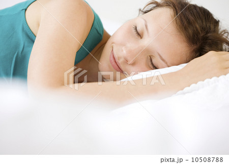 Close up of teenage girl sleeping 10508788