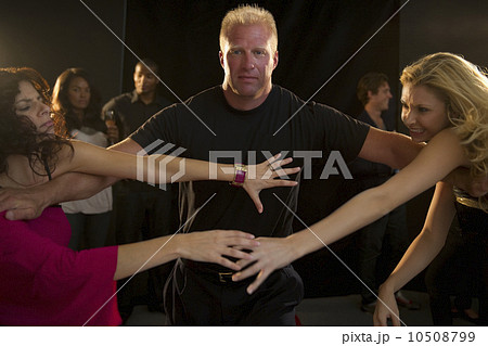 Bouncer separating fight outside club Bouncer separating fight outside club 10508799