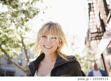 USA, New York, Williamsburg, Brooklyn, Portrait of smiling woman USA, New York, Williamsburg, Brooklyn, Portrait of smiling woman 10509514