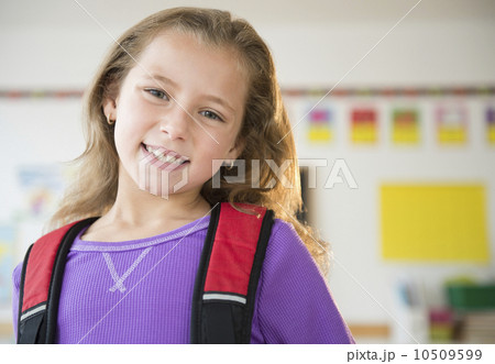 Portrait of smiling girl (8-9) 10509599