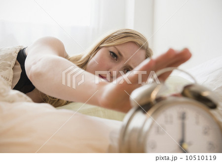Young woman in bed Young woman in bed 10510119