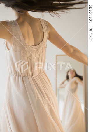 Bride trying on wedding dress Bride trying on wedding dress 10510250
