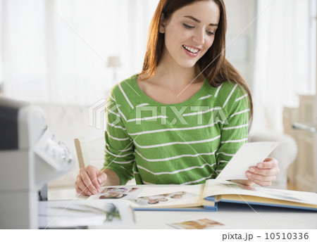 Young woman counting bills 10510336