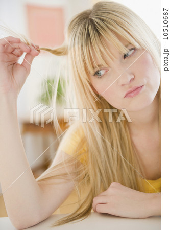 USA, New Jersey, Jersey City, young woman looking sad 10510687