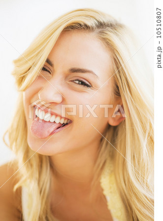 Portrait of teenage girl (16-17) sticking tongue out Portrait of teenage girl (16-17) sticking tongue out 10510807