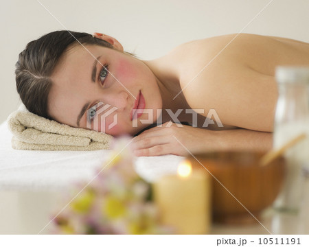 USA, Jersey City, New Jersey, woman lying on massage table USA, Jersey City, New Jersey, woman lying on massage table 10511191