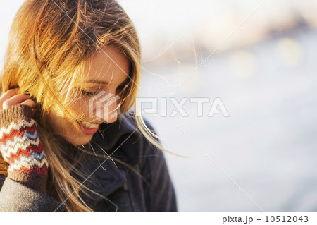 Portrait of woman in sunlight 10512043