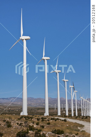 USA, California, Palm Springs, Wind turbines against blue sky 10512168