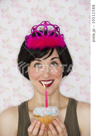 Birthday girl holding a cupcake Birthday girl holding a cupcake 10512588