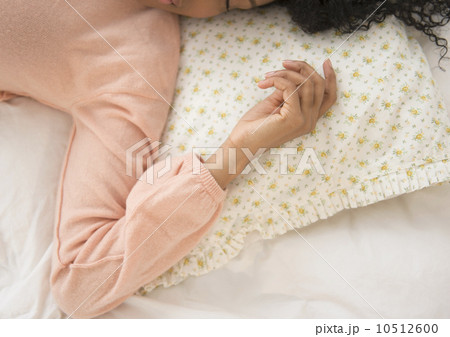 Elevated view of woman sleeping 10512600