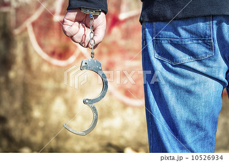 Man with handcuffs Man with handcuffs 10526934
