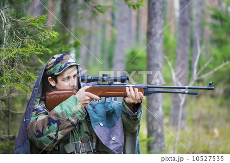 Recruit with optical rifle hidden in the backwoods Recruit with optical rifle hidden in the backwoods 10527535