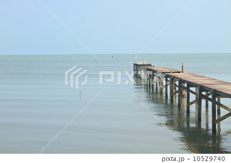 Wooden bridge into the sea Wooden bridge into the sea 10529740