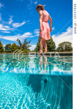 Girl Testing Pool Water Girl Testing Pool Water 10537938