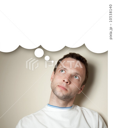 Thinking young Caucasian man with white balloon. Closeup portrai 10538140