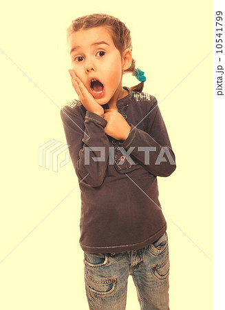 girl surprised little woman teenager feels joy holding hand on f 10541799