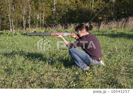 The girl aims from a gun 10543257