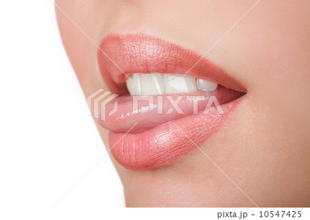 Young cheerful girl showing tongue 10547425